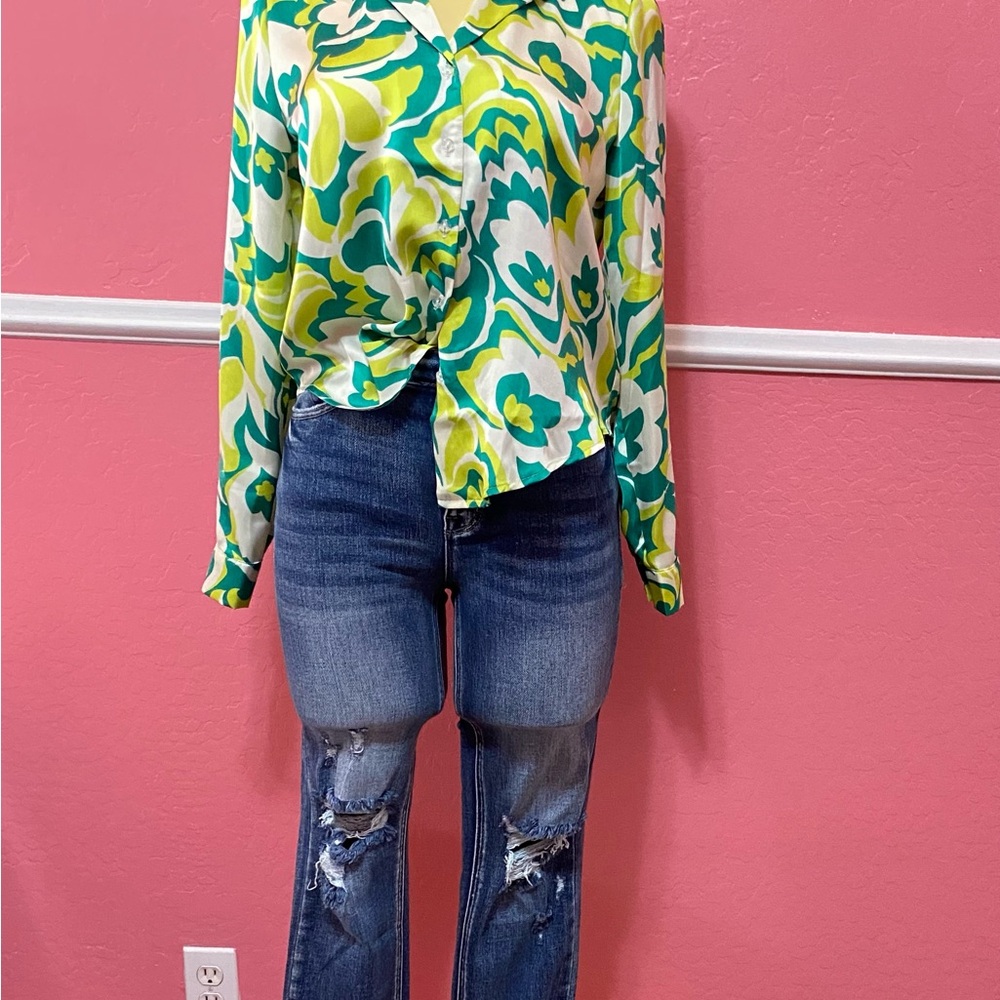 Vibrant Patterned Blouse and Distressed Jeans